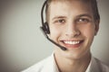 Customer support operator with a headset on white background Royalty Free Stock Photo