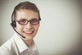 Customer support operator with a headset on white background Royalty Free Stock Photo