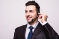 Customer support operator with a headset on white Royalty Free Stock Photo