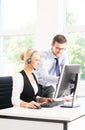 Customer support operators in formalwear working in a call center Royalty Free Stock Photo