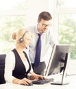 Customer support operators in formalwear working in call center Royalty Free Stock Photo