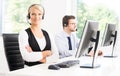 Customer support operators in formalwear working using computers Royalty Free Stock Photo