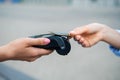 Customer using a payment terminal for contactless transaction at outdoor market Royalty Free Stock Photo