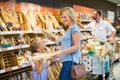 Customers in bread section in food store Royalty Free Stock Photo