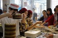 Customers buy chinese fast food in the arluohai town square