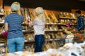 Customers buying bread in food shop Royalty Free Stock Photo