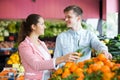 Customers buying oranges Royalty Free Stock Photo