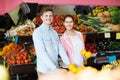 Customers buying oranges Royalty Free Stock Photo