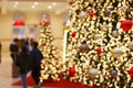 Customers in Christmassy Decorated Shopping Mall - Detailled Blurred Scene Royalty Free Stock Photo