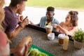 Customers couple ordering something at food truck