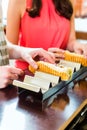 Customers eating Hotdog in fast food snack bar Royalty Free Stock Photo