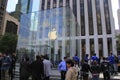 Customers line up outside of the Apple Store on Fifth Avenue to buy the new iPhone 6