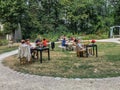 Customers lounging at the garden cafe tables at Montmartre Museum