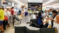 Customers paying for shopping at a supermarket