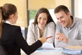 Customers ready to sign a contract at office Royalty Free Stock Photo