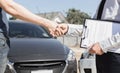 Customers shake hand with car insurance agents to enter into friendly terms and conditions Royalty Free Stock Photo