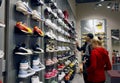 Customers shopping in mall - Puma store interior Royalty Free Stock Photo