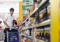 Customers shopping at supermarket