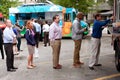 Customers Stand In Line To Order Meals From Food Trucks