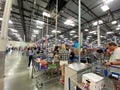 Customers standing in long lines waiting to check out their groceries at a Sams Club in Orlando, Florida