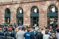 Customers waiting in front of Apple Store