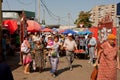 Customers walk on Central Asian market