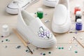 Customization of white slip-on shoes