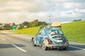 Customized Beetle driving on Imigrantes Highway Royalty Free Stock Photo