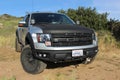 A customized Ford F-150 Raptor SVT on a dirt road Royalty Free Stock Photo