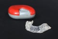 Customized transparent dental teeth bite guard clear aligners for lower jaw in front of blurry case
