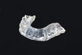 Customized transparent teeth bite guard clear aligners for lower jaw Royalty Free Stock Photo