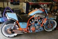 Customized Yamaha motorbike in small workshop