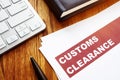 Customs clearance documents on a table. Royalty Free Stock Photo