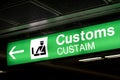 Customs sign in Airport and direction arrow