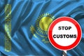 Customs sign, stop, attention on the background of the silk national flag of Kazakhstan, the concept of border and customs control