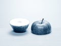 Cut apple, top and bottom half, side by side Royalty Free Stock Photo
