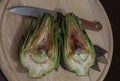 Cut artichoke on the table Royalty Free Stock Photo
