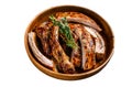 Cut BBQ grilled lamb rack spareribs in a wooden plate Isolated on white background, top view. Royalty Free Stock Photo