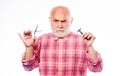 Cut beard facial hair. Mature man barber hold scissors and shaving blade on white background. Cut or shave. Pick perfect