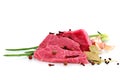 Cut of beef steak with garlic slice, onion and