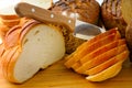 Cut bread and knife Royalty Free Stock Photo