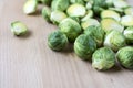 Cut brussels sprout lay flat on wooden board