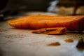 A cut carrot where the house has a small worm Royalty Free Stock Photo