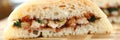 Cut chiken sandwich with ketchup against kitchen background