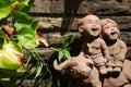 Cut child doll in garden