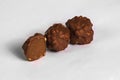 Cut chocolate truffles on white background Royalty Free Stock Photo