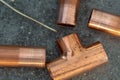 Copper fittings with a strand of sodder Royalty Free Stock Photo