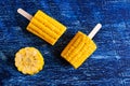 Cut corn on the cob on a stick Royalty Free Stock Photo