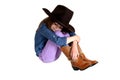 Cut cowgirl with her knees up sleeping in her big hat