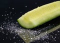 Cut cucumbers black background 1 Royalty Free Stock Photo